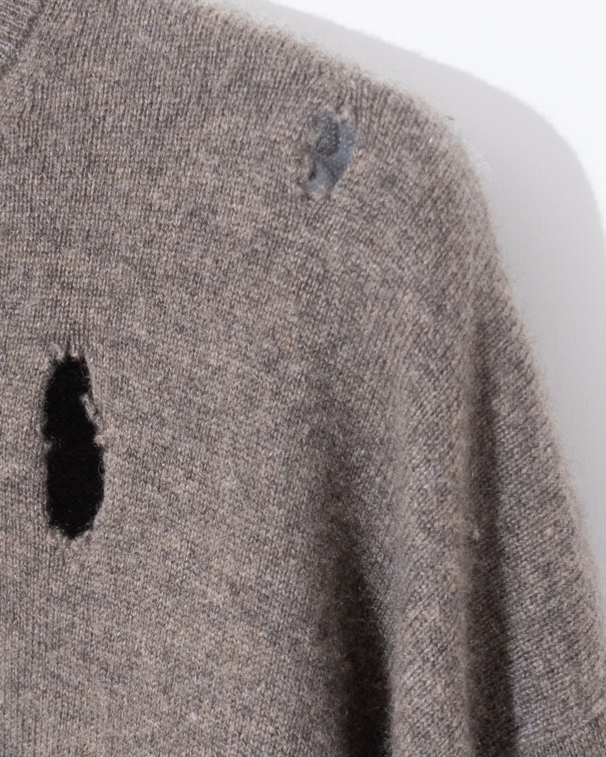 Damaged cashmere knit
