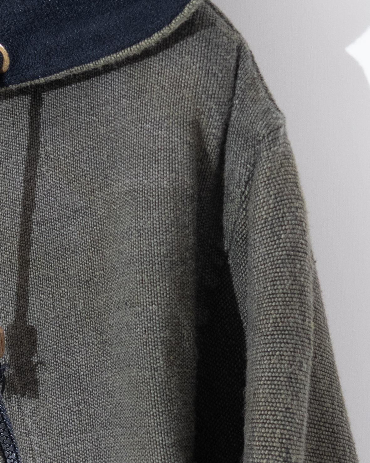 Diagonal zip hooded jacket