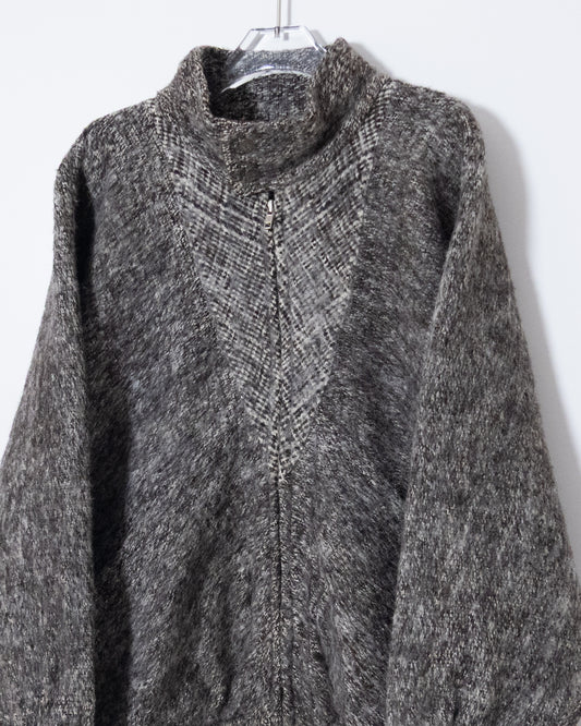 Dolman sleeve panel switch wool knit blouson