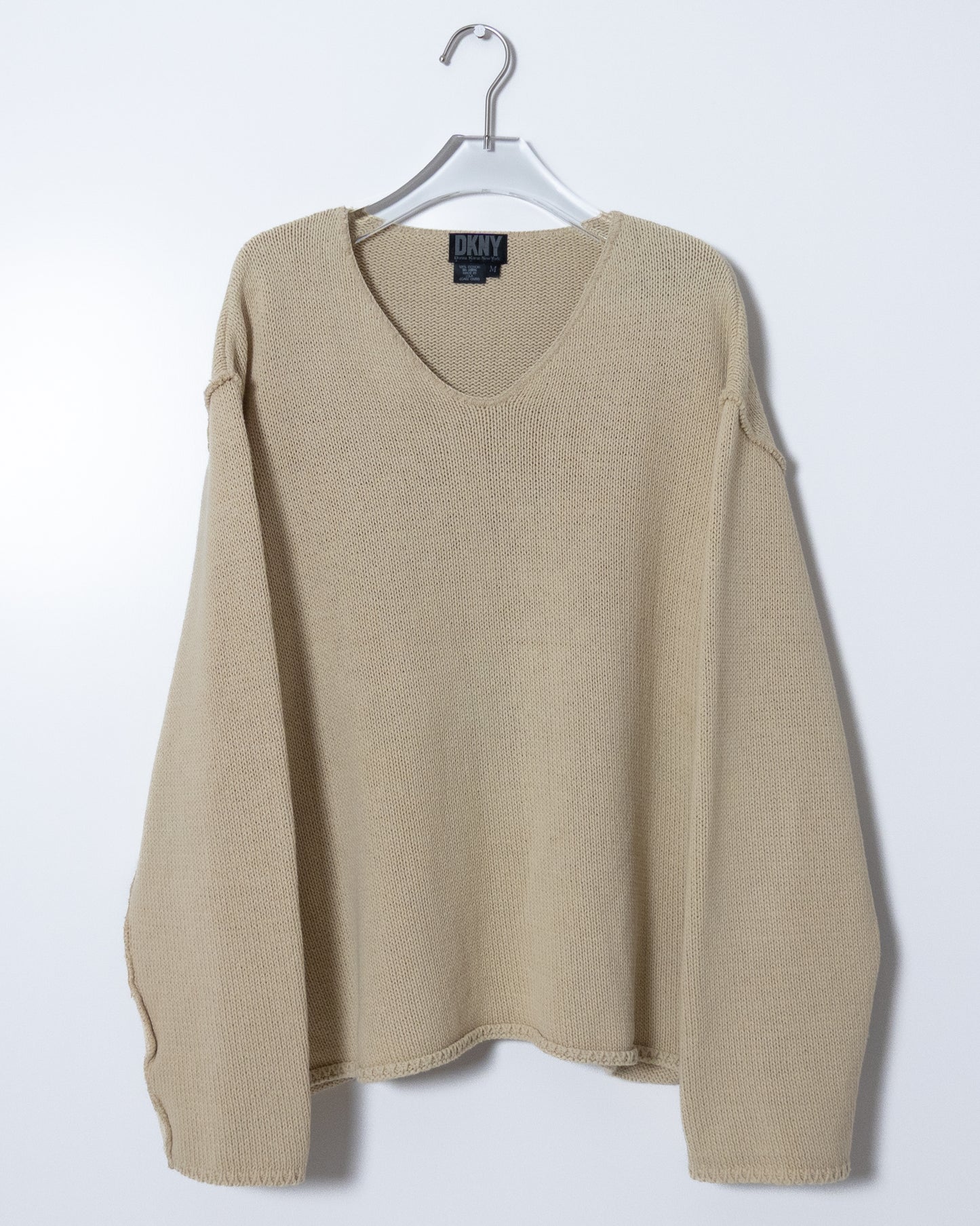 "DKNY" inside-out v-neck cotton knit sweater