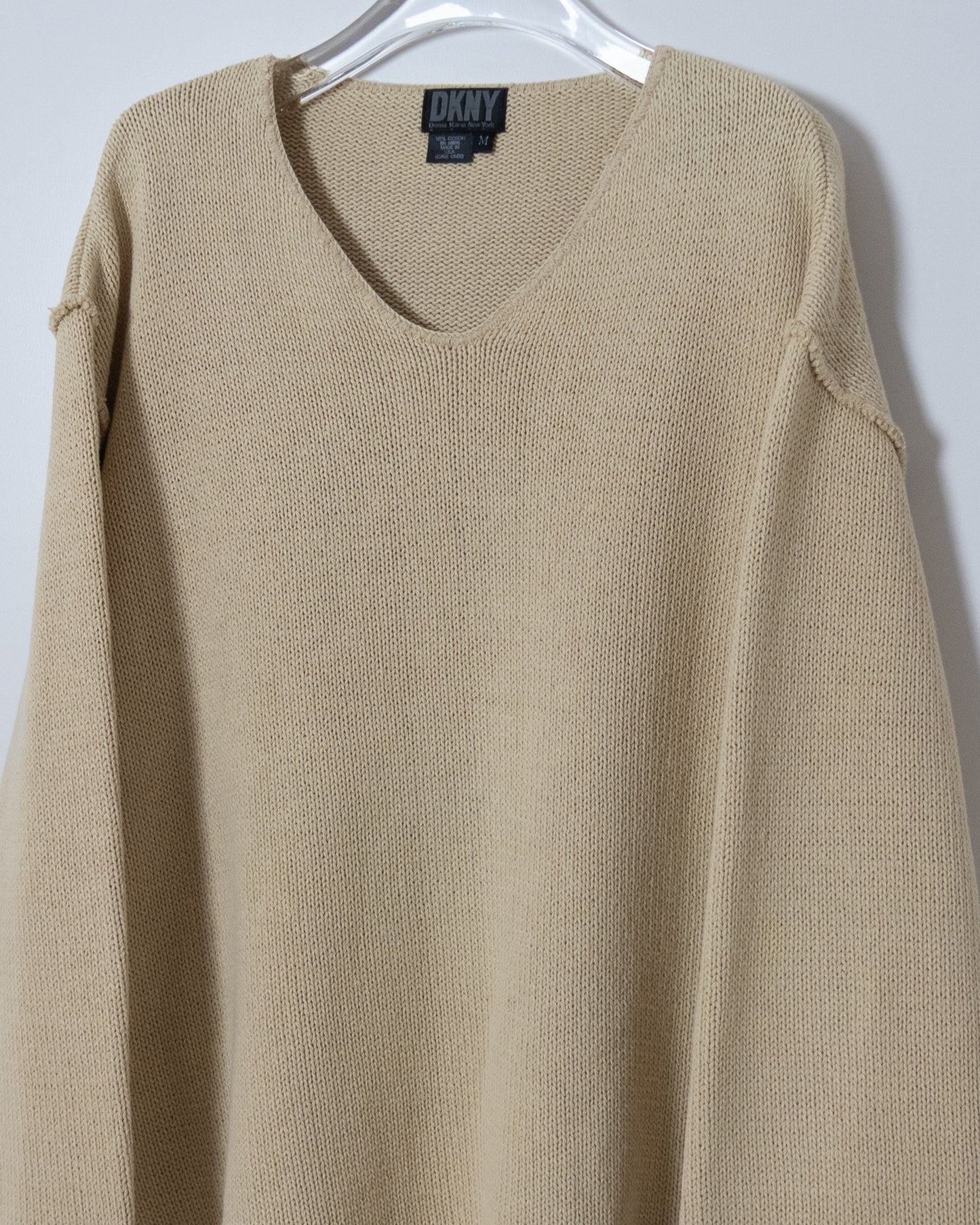 "DKNY" inside-out v-neck cotton knit sweater