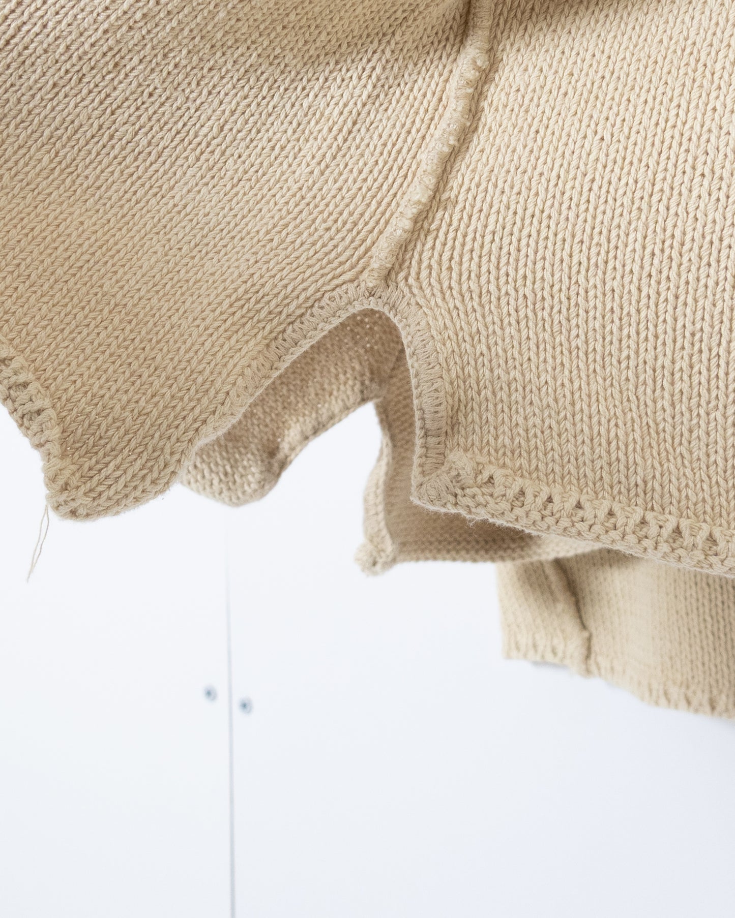 "DKNY" inside-out v-neck cotton knit sweater